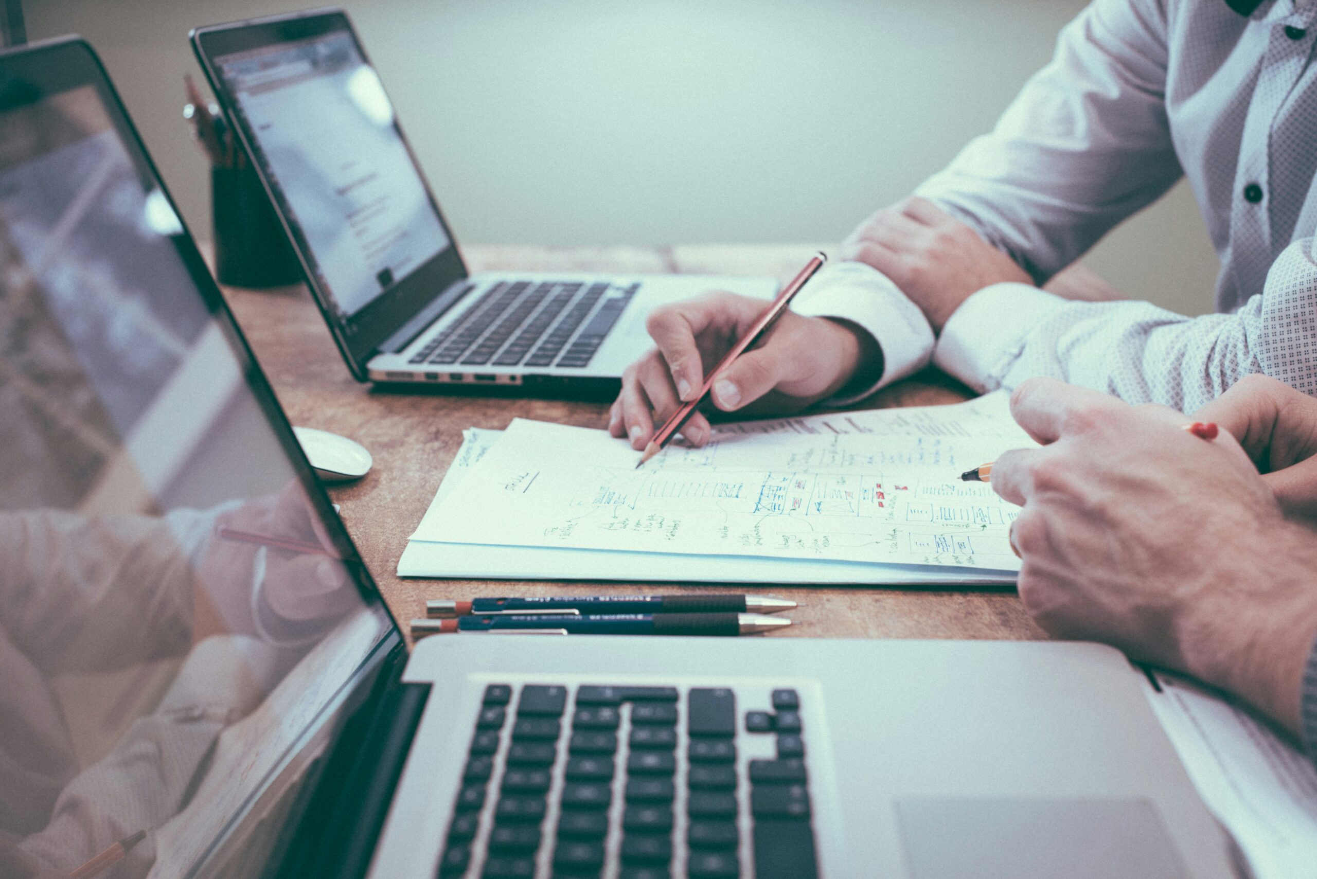 Understanding TDS Under Section 194H: A Guide for Brokers person holding pencil near